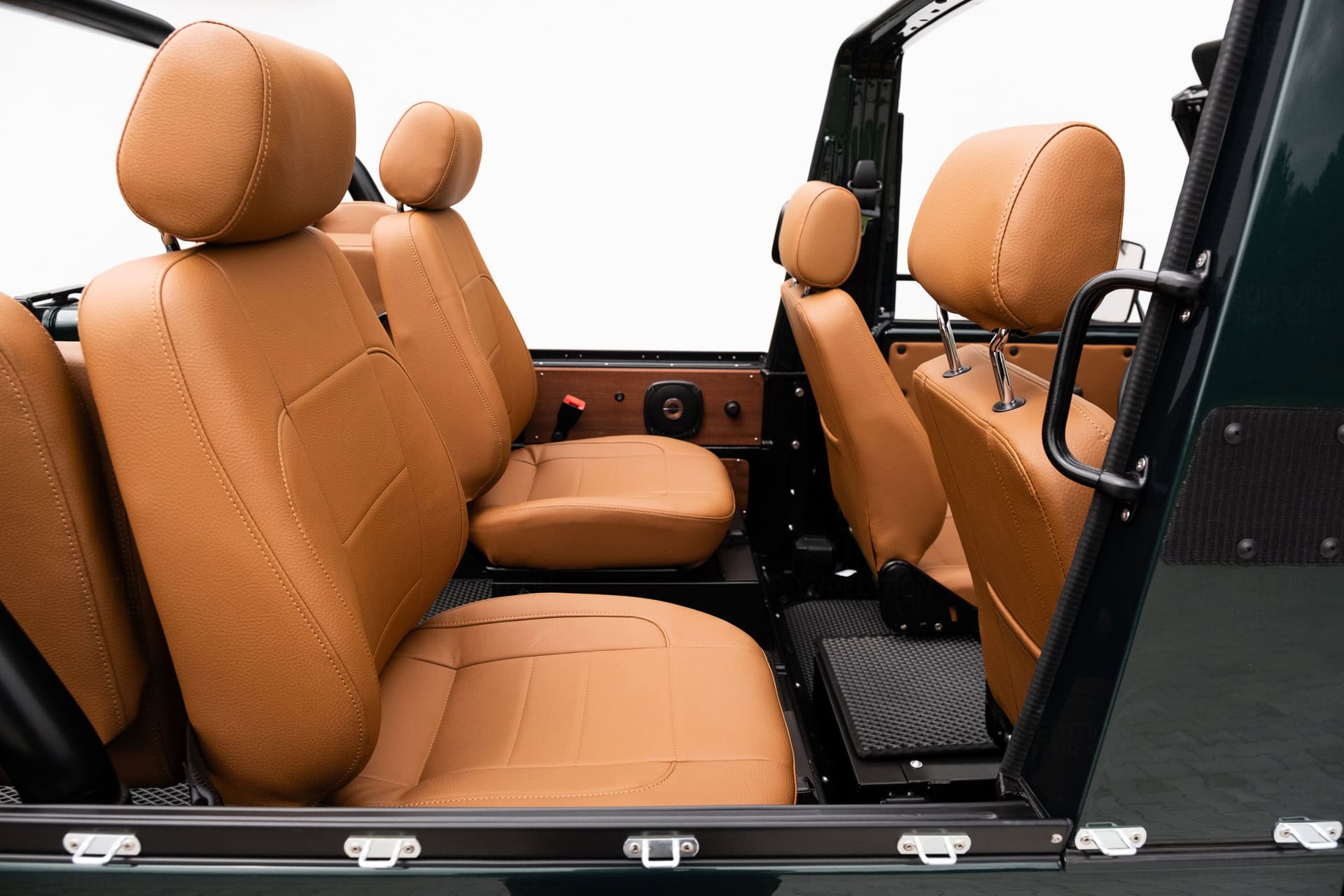 Custom G Wagon interior featuring hand-stitched Chestnut weatherproof upholstery.